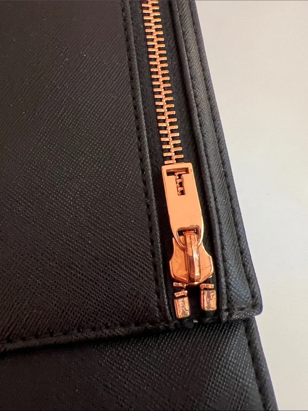 TED BAKER Black saffiano envelope-style clutch dual rose-gold zipper accent